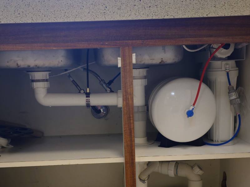 A reverse osmosis drinking water system installed under a sink